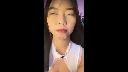 Asian Cutie Rubbing Her Cunt In Sexy Nun Costume