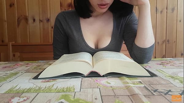Big titted small girl cums while reading a book with a vibrator in her pants - UnlimitedOrgasm