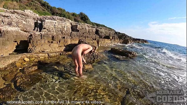 big boob model rebeka ruby swims naked in the sea while on vacation splashing water on her body