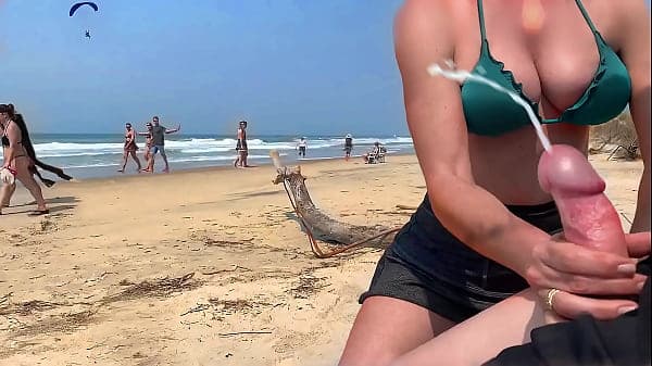 Milf jerks me off in front of everyone. Public ...